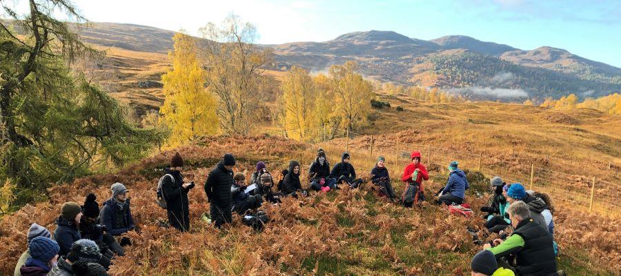 Students being taught outdoors