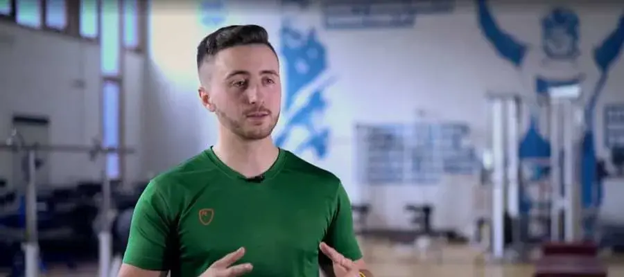 Adam speaking in the gym