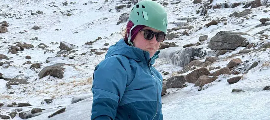 Taylor Halik posing on a mountain