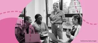 Teacher speaking with students