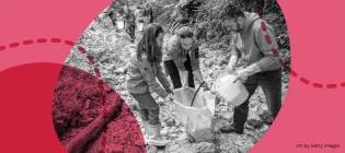 Man and children working on a beach