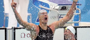 Olympian swimmer celebrating