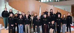 steering group photo taken in Olympic House in Lausanne 