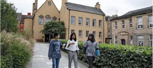 Students walk past Old Moray House.
