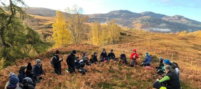 Students being taught outdoors