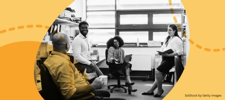 People in an office talking