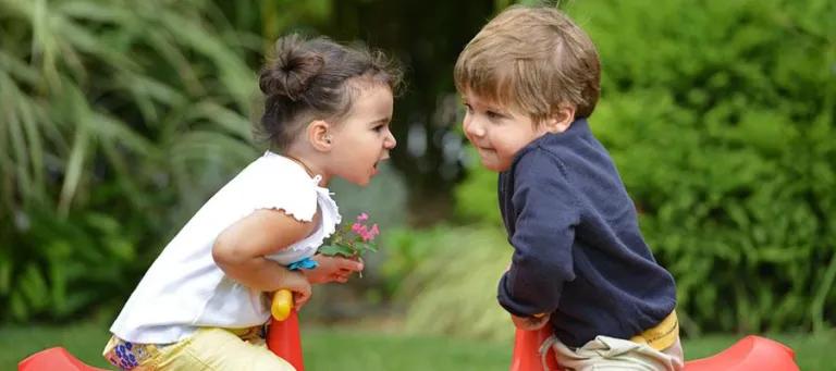 Two deaf children playing