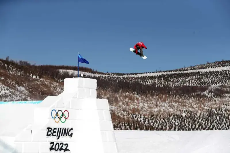 Snowboarder performing during the 2022 Winter Olympics