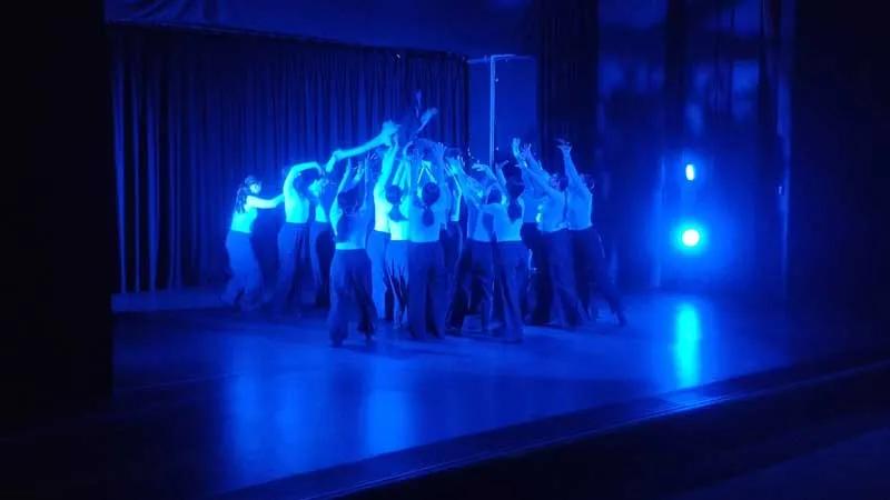 Dancers performing onstage in Drift
