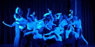 Dancers performing in Drift onstage