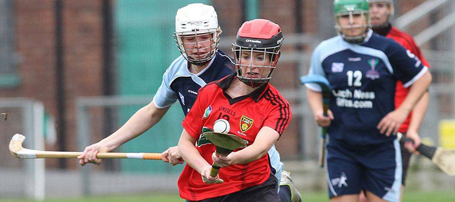 Women playing shinty